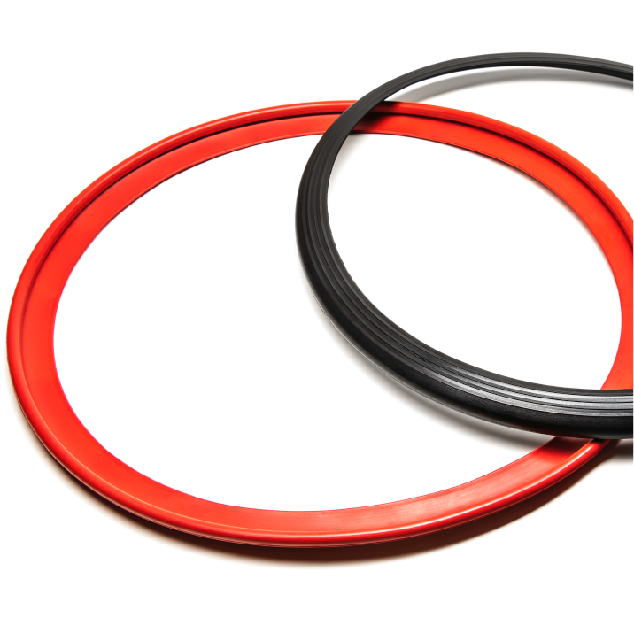 Image of overlapping red and black RIMFINITY products on a white background