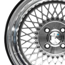 Load image into Gallery viewer, Black RIMFINITY on a bare, chrome alloy wheel
